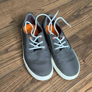 Black and White Casual Sneakers with Orange Accents